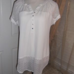 all white women's blouse with sheer dot detail